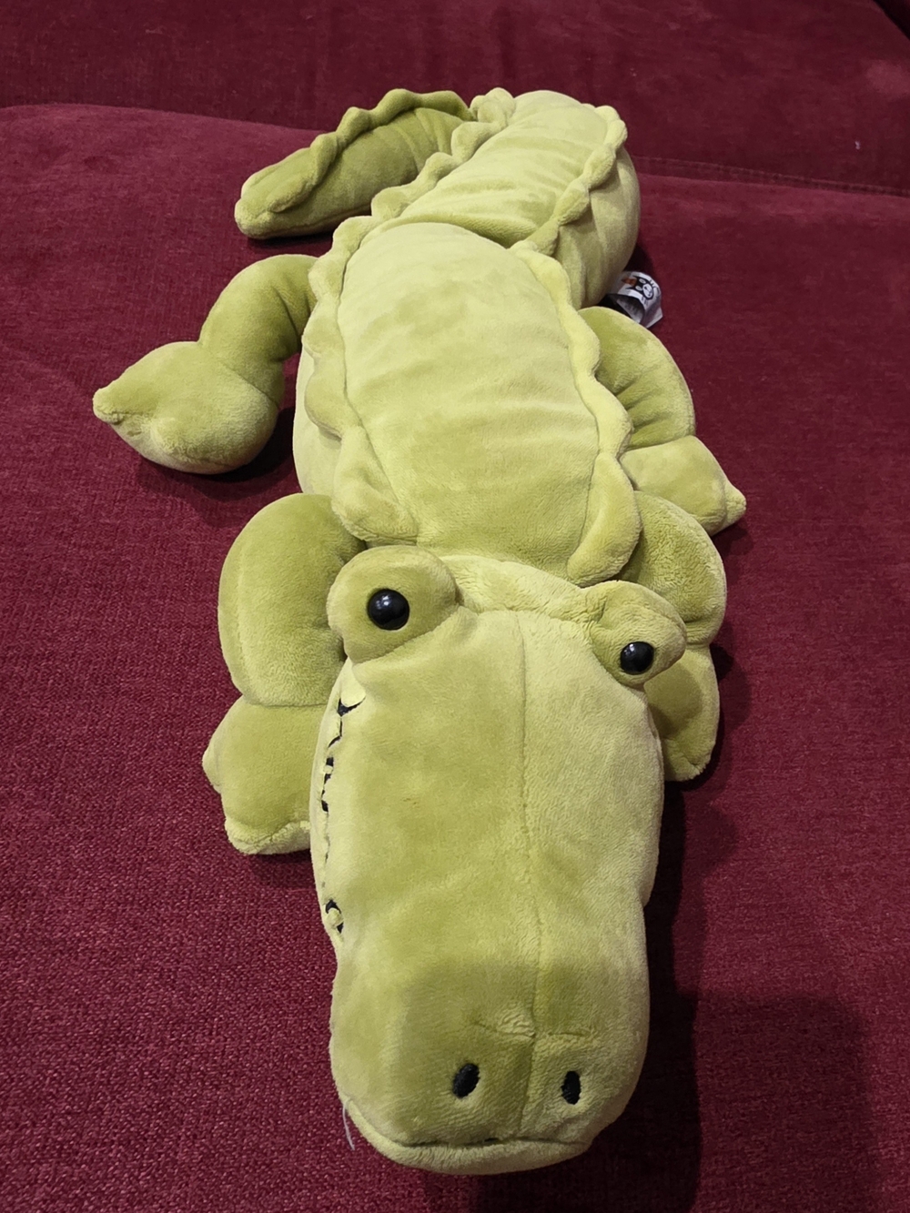 Jellycat Zigzag Croc, a retired plush toy featuring vibrant green velvety fur